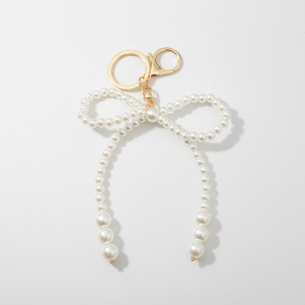 🎁 Pearl Bow Bag Charm Keychain (100% off)
