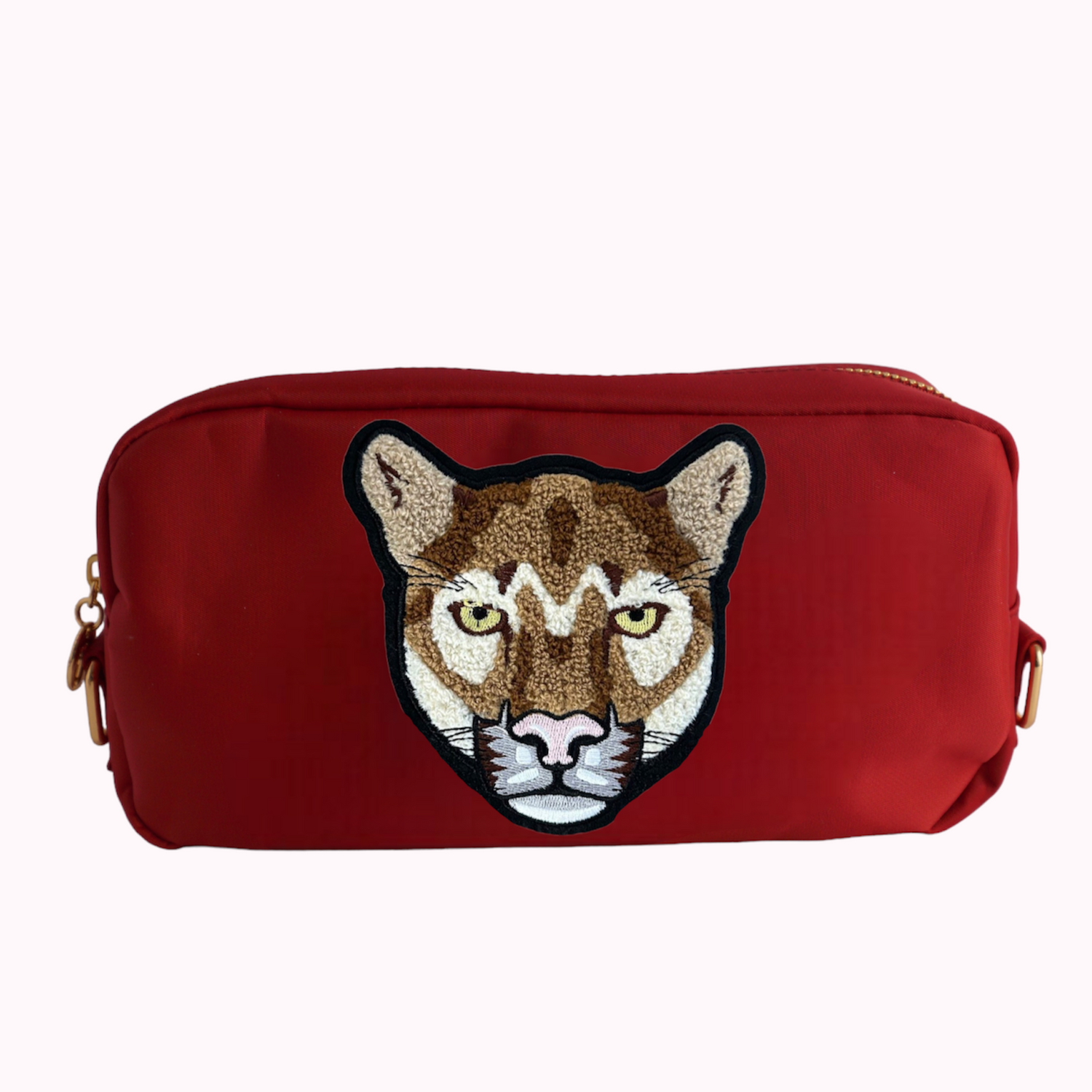Crimson medium crossbody bag with cougar patch. 